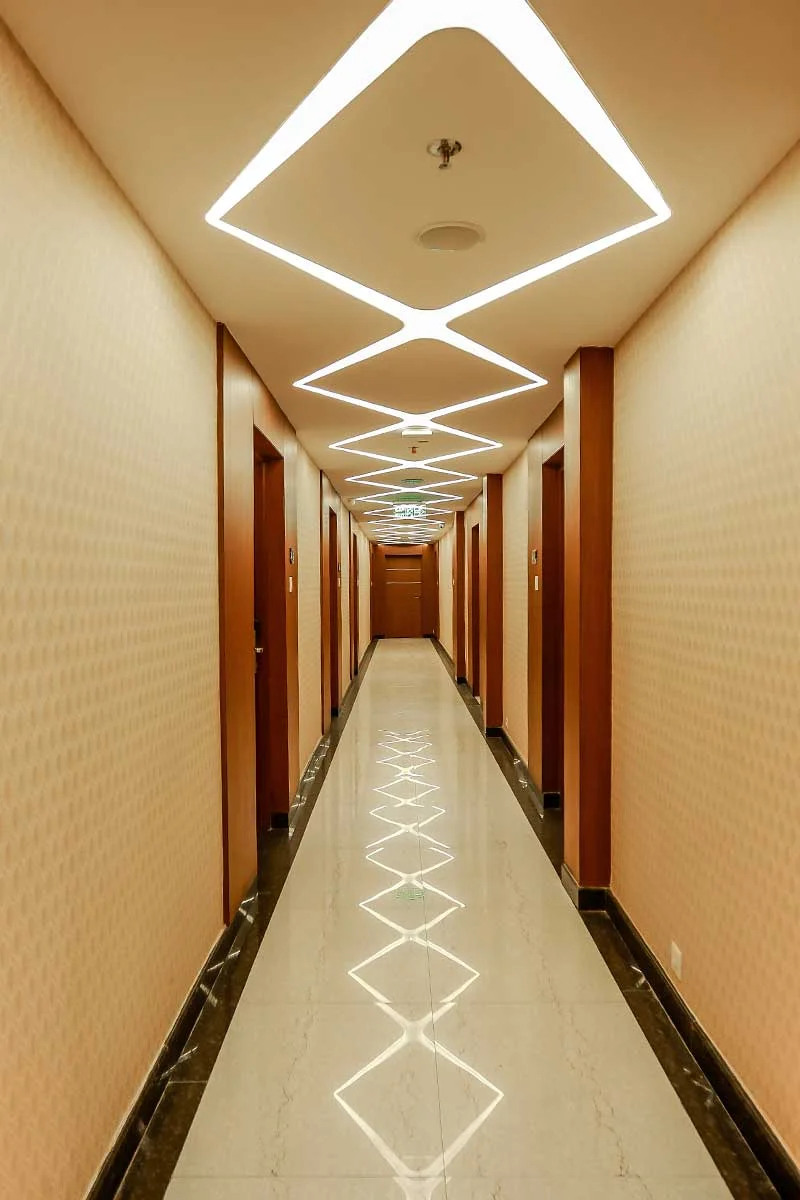 Illuminated corridor at Nesma Palace